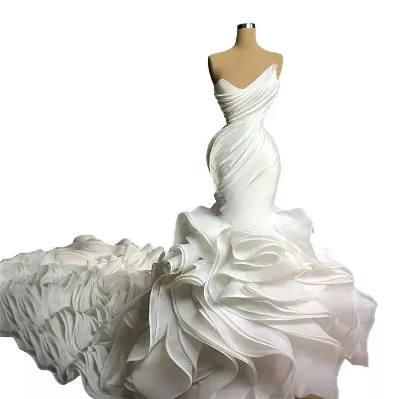 Ellegant Mermaid Wedding Gown. Ruffeled bridal gown with train.