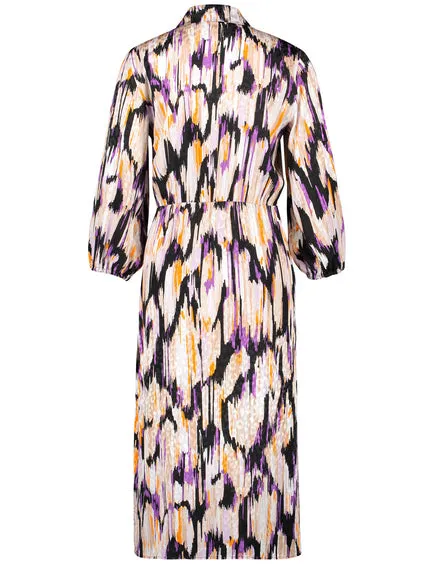 GERRY WEBER <BR>
Patterned blouse dress with a wrap-over skirt <BR>
Purple mix <BR>