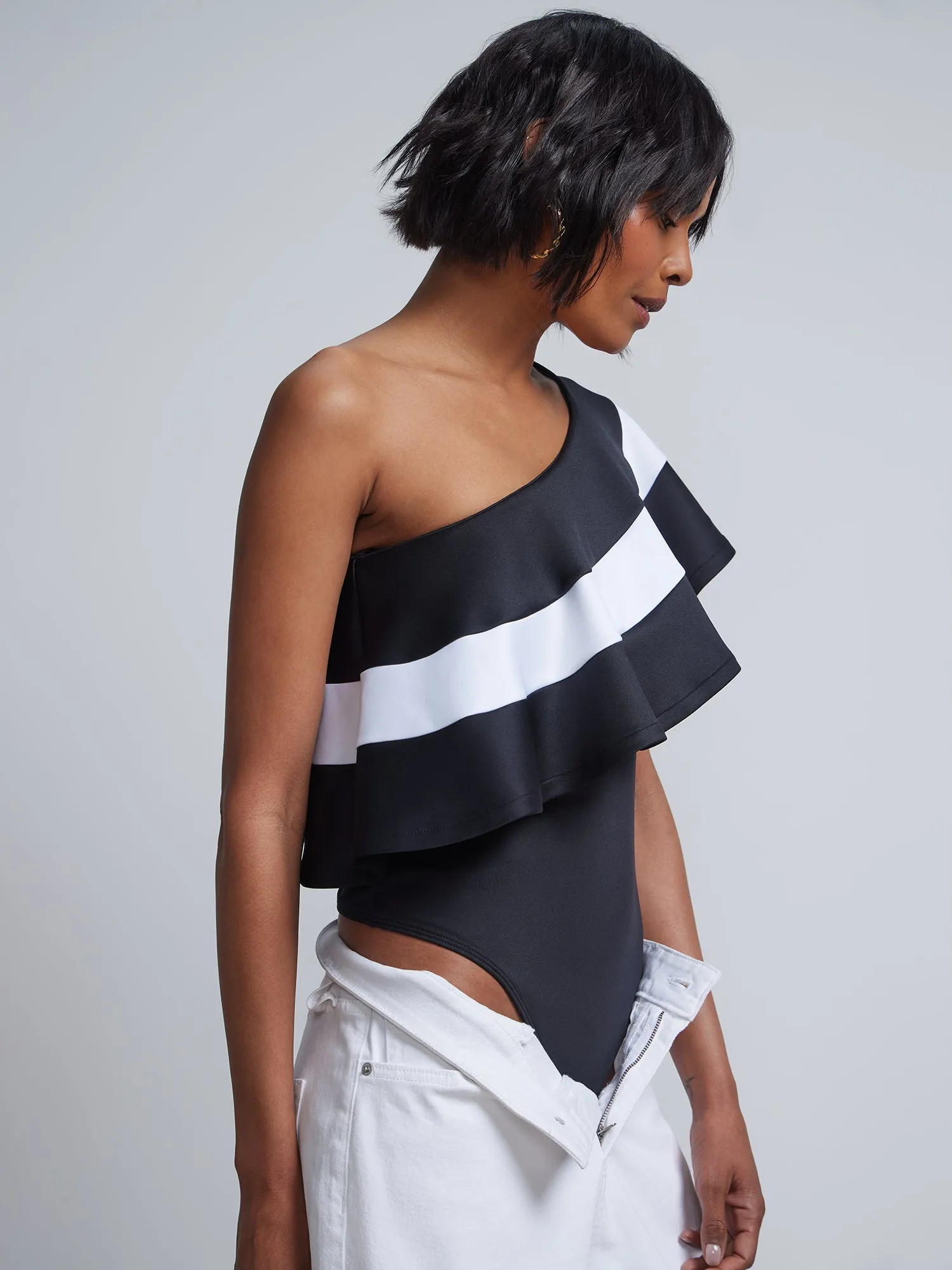 One-Shoulder Piped Ruffle Knit Bodysuit