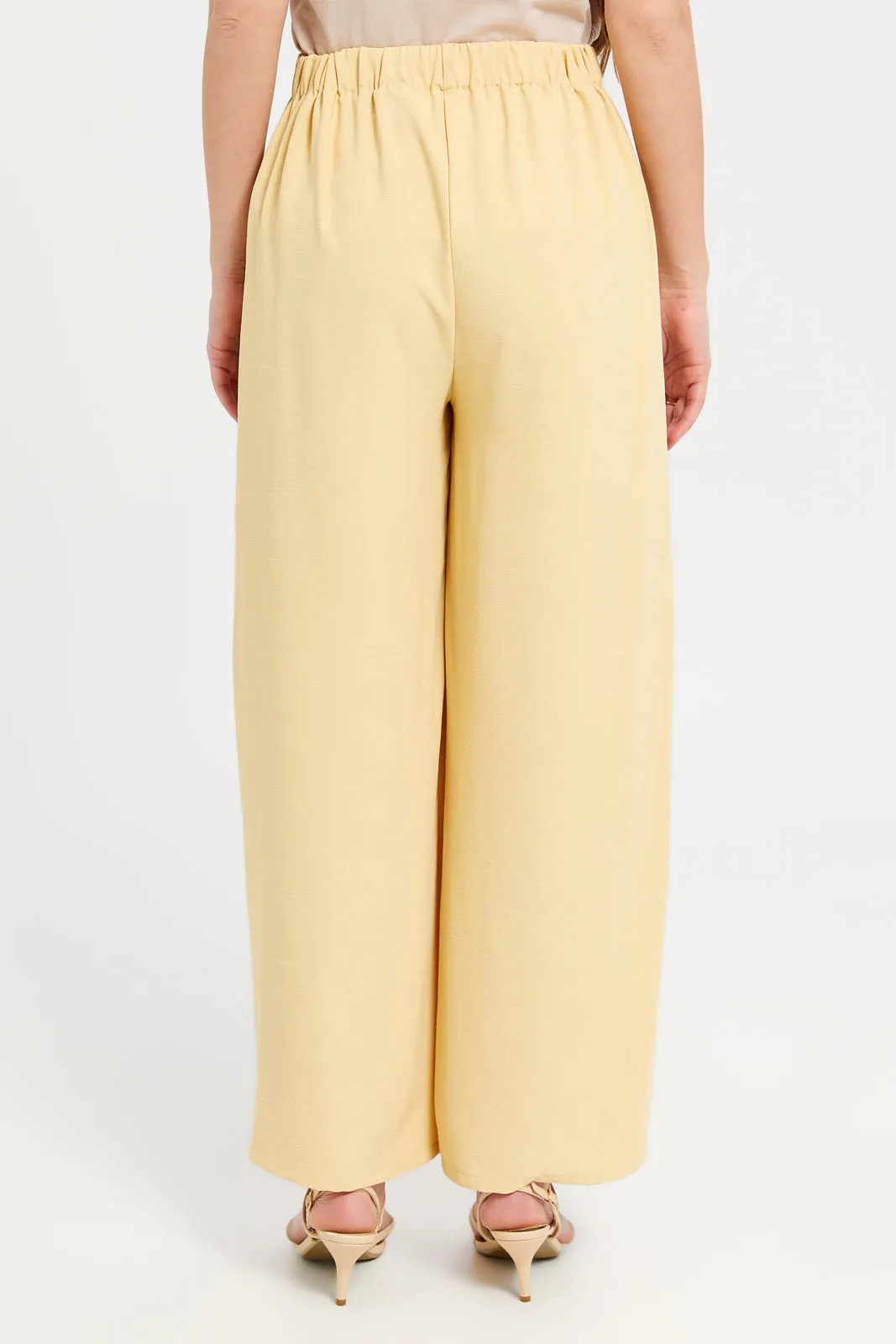 Women Yellow Textured Slit Detailed Trousers